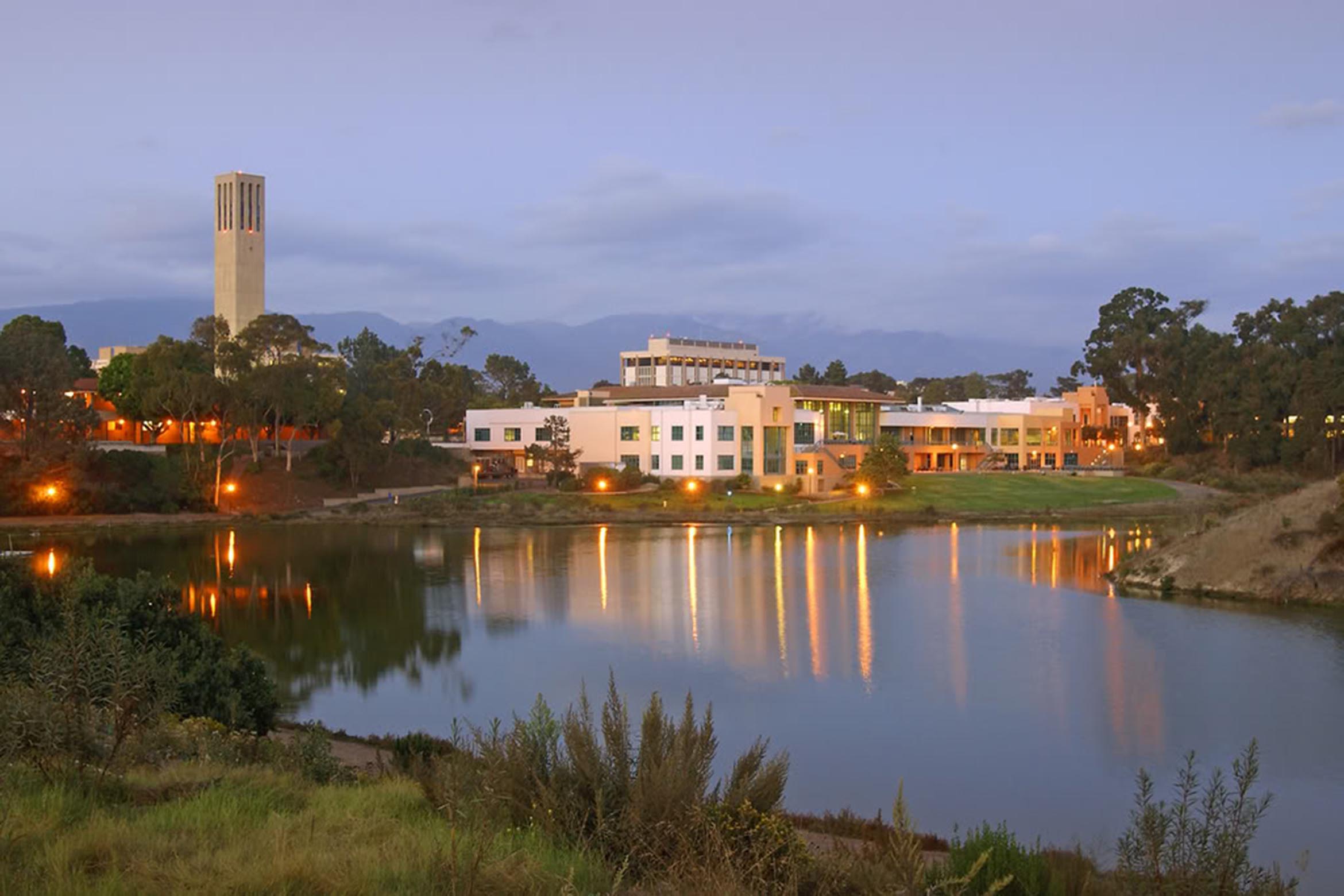 scenic view of the ucen from across the lagoon at dusk