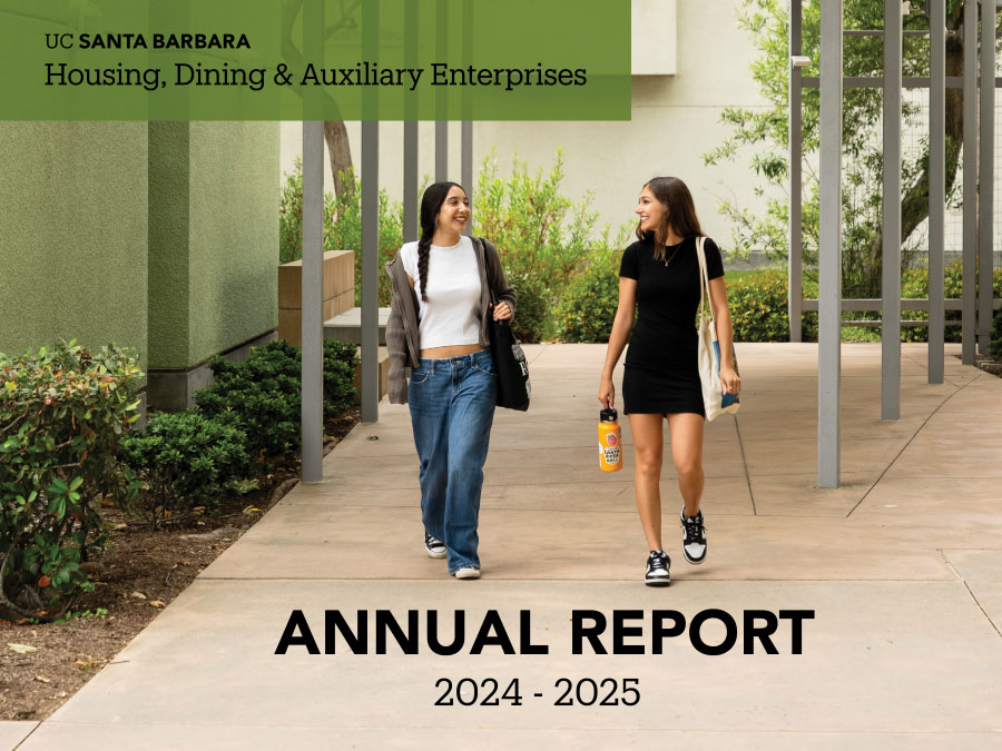 two students walking near residence hall