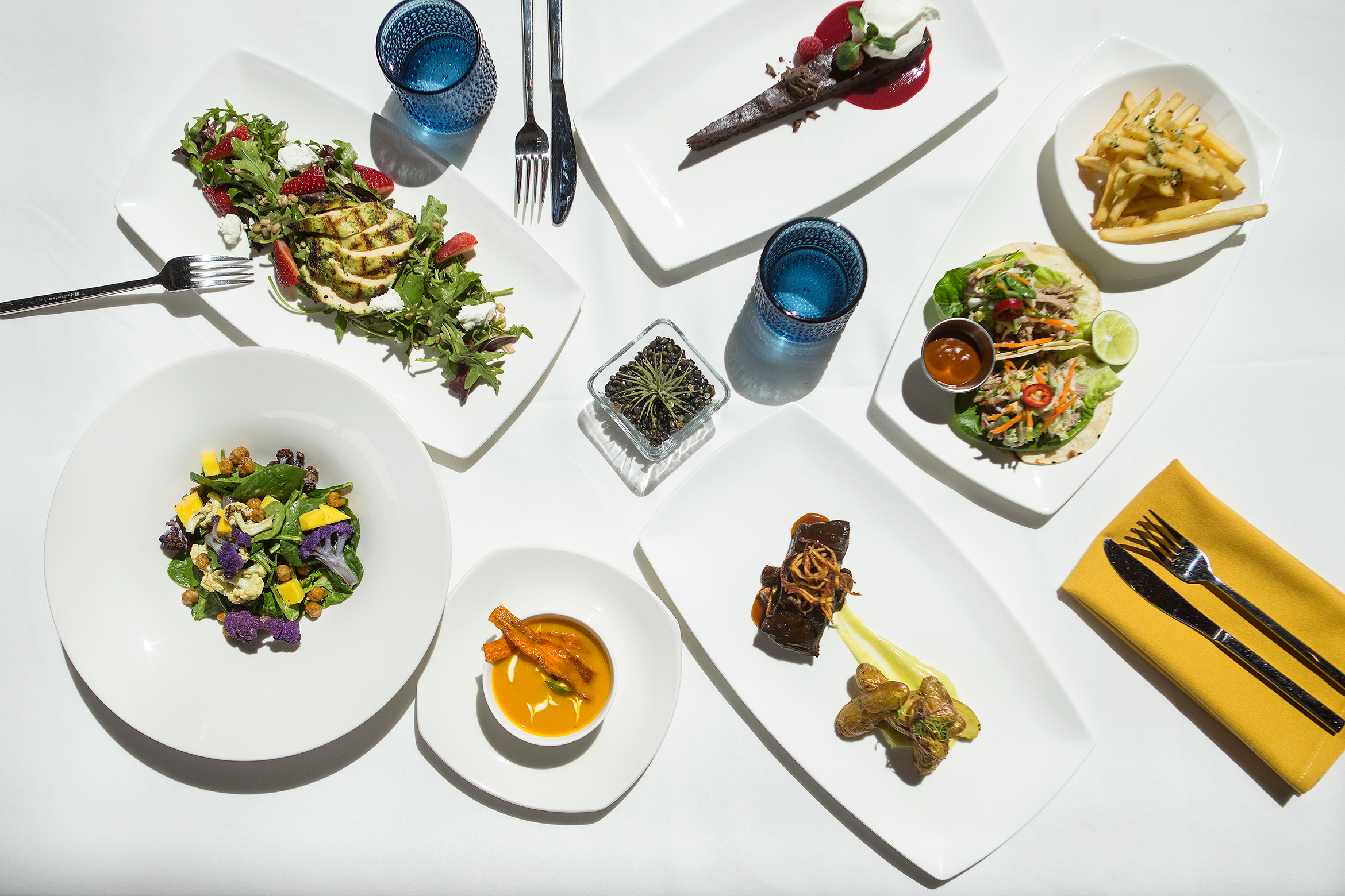 table with food on top that is served at the club and guesthouse