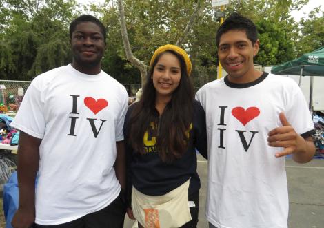 Volunteers Manny, Jasmine, and Adam at Project GIVE