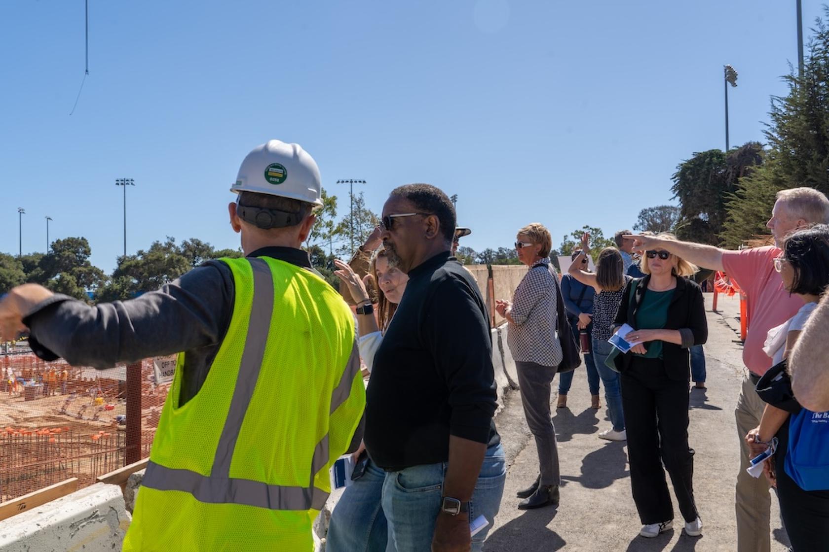 People looking at a construction site